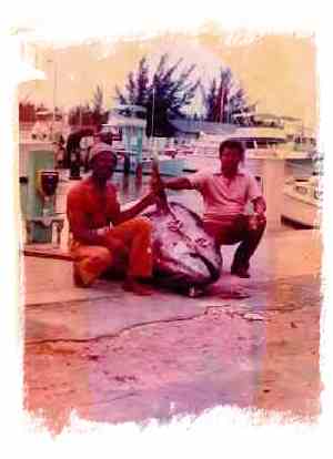 Here is a picture of Baby Doc Grant with a world record Blue Fin Tuna